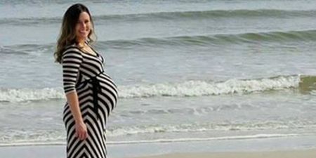 Pregnant Woman Gets Photobombed by Dolphin
