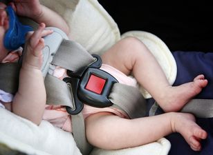 Baby girl rescued after being trapped in a hot car for hours