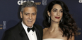 Nwah! Amal Clooney debuted her growing bump in a STUNNING gown last night