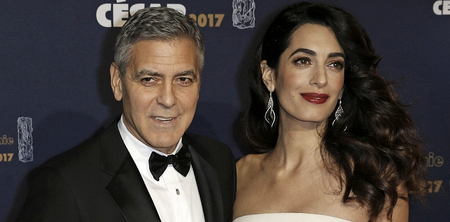 Nwah! Amal Clooney debuted her growing bump in a STUNNING gown last night