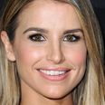 Glowing Vogue Williams shows off her bare bump on Irish magazine cover