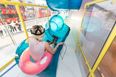 Forget bringing the kids to a theme park: Topshop now has a waterslide