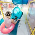 Forget bringing the kids to a theme park: Topshop now has a waterslide