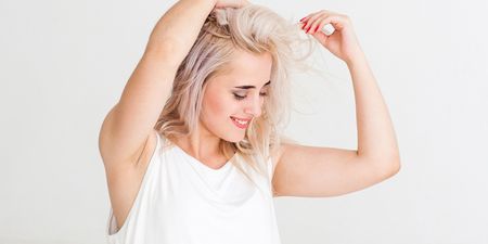 Here’s why you get those yellow pit stains on white tops