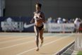 Athlete runs 800m race wearing Wonder Woman top (five months pregnant)