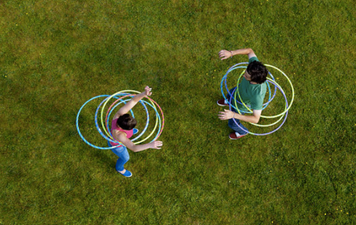 This dad taught his baby to walk using a hula-hoop and it’s adorable