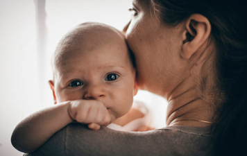 Stranger tried to ‘grab’ mum’s baby when she answered the door