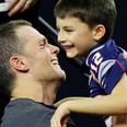 American footballer faces criticism for kissing 11-year-old son on the lips