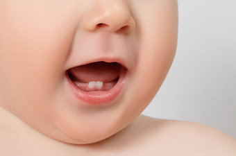 This is when and where you should expect your child’s first teeth to appear