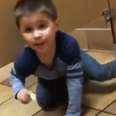 A little boy innocently climbed under a man’s bathroom stall while he was using the toilet