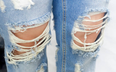 Student has to cover up rips in jeans with duct tape… gets rash