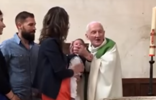 Shocking video shows Priest losing temper and slapping a crying baby