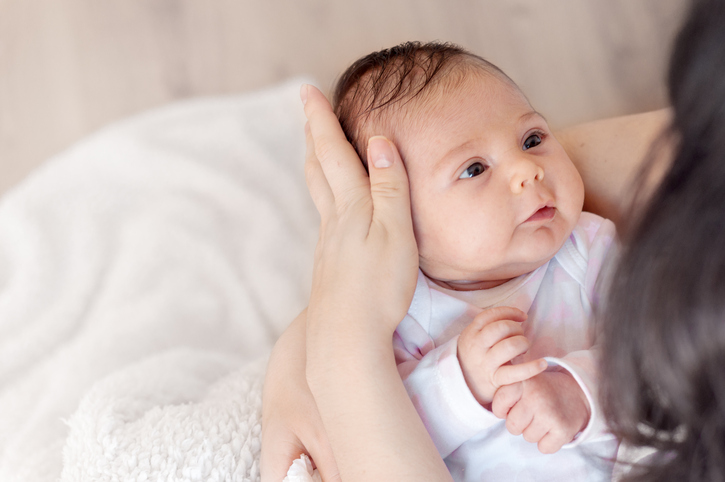 Stroking your baby’s head reduces how they feel physical pain by 40 per cent