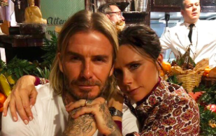 David and Victoria Beckham share intimate kiss in rare snap on holidays