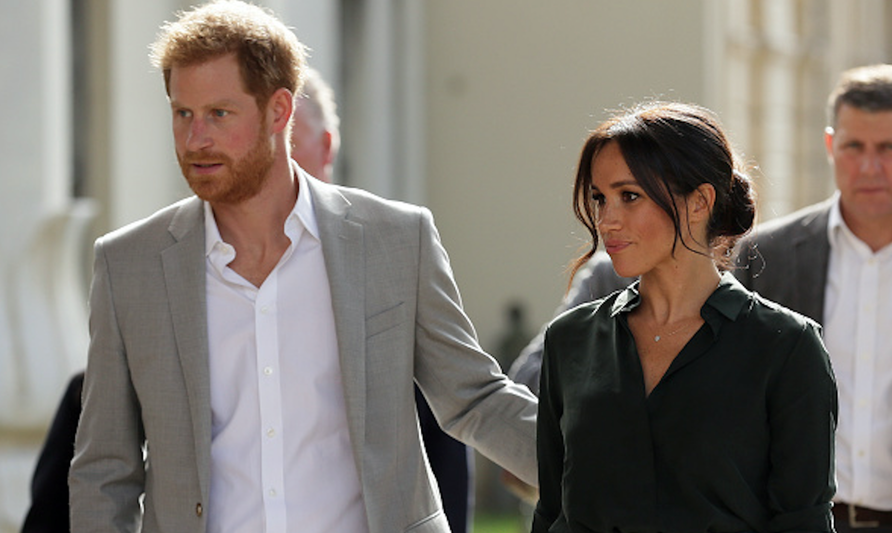 Body language expert says Meghan and Harry were having a row at Eugenie's wedding