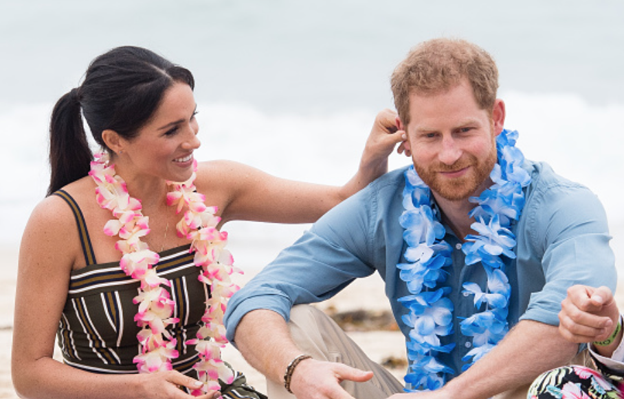 Meghan and Harry were very touchy-feely on Bondi Beach this morning