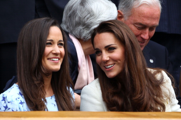 Duchess Kate and her sister Pippa pictured in the exact same high-street dress