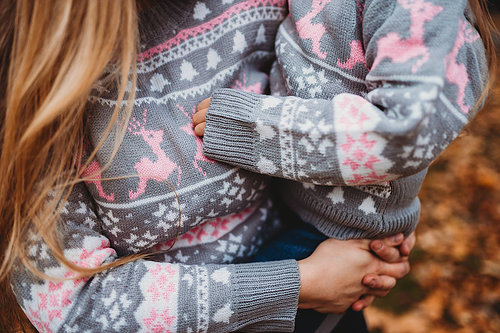 Matching mother and daughter Christmas jumpers that are twinning goals