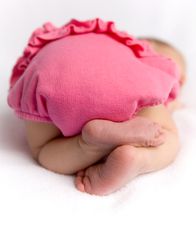 There’s a reason why babies love to sleep with their bum in the air and it’s adorable