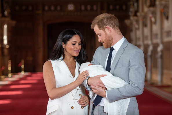 Why is everyone making such a big deal about Prince Harry holding his baby son?