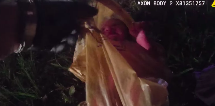 Police footage shows newborn baby found alive inside plastic bag