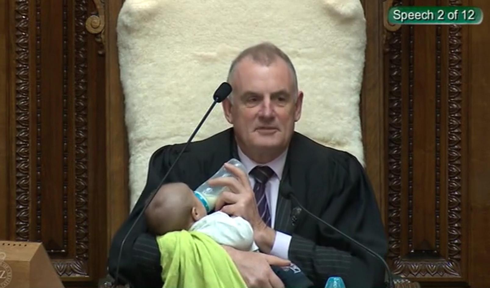 New Zealand speaker Trevor Mallard feeds colleague’s newborn baby during parliament debate