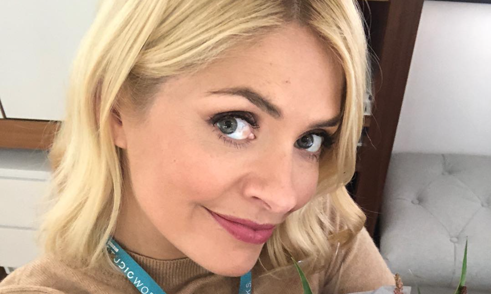 Holly Willoughby just wore the most beautiful €72 midi dress from Warehouse