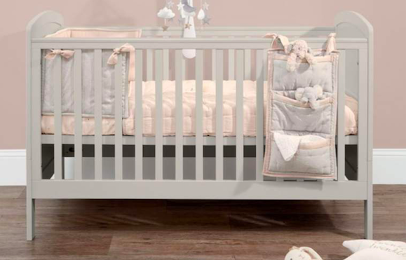 WIN a gorgeously cosy wood panelled cot and playmat bundle worth over €500