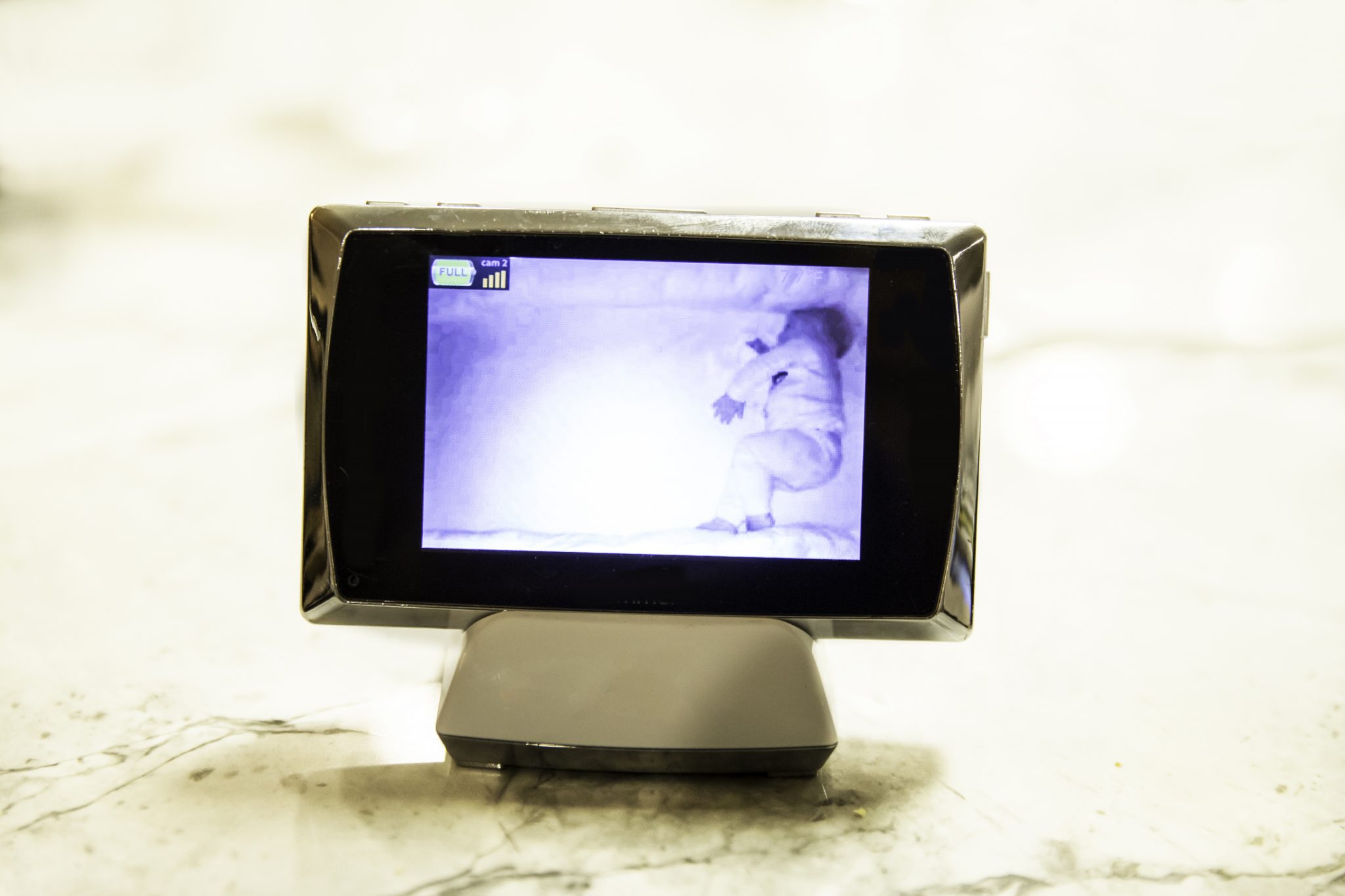 Mum thinks she spots ghost on baby monitor but it was actually part of the crib