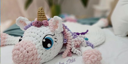 You can crochet this unicorn playmat using your arm – no needles needed