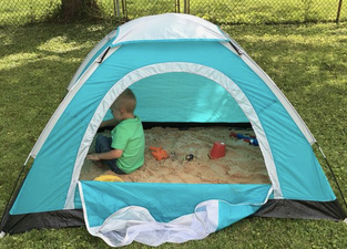 #entertainingathome: Parents are making sandpits for their kids using tents