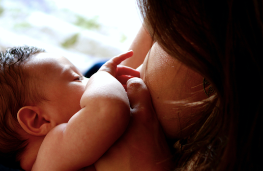 breastfeeding cuts SIDS risk