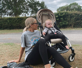 Rosie Connolly attempting to get a picture with her 1 year old is all kinds of cute