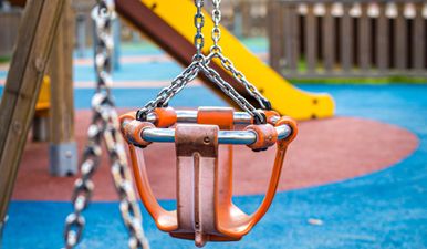 Three-year-old girl fatally injured in playground accident where dad fell on top of her