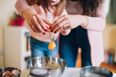 Mum lets one-year-old cook eggs on the stove – what age is too young?