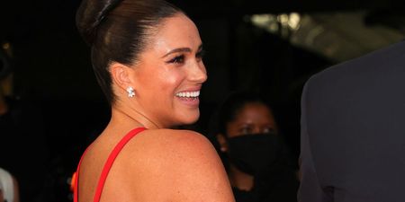Prince Harry and Meghan Markle make rare red carpet appearance and her dress is flawless
