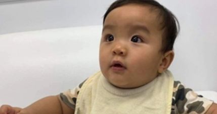 Australian police fear for welfare of baby whose parents claim they left with woman in shop