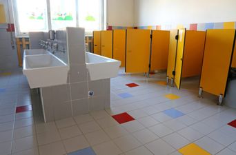 Parents express their concerns after school puts lockable gates on toilets
