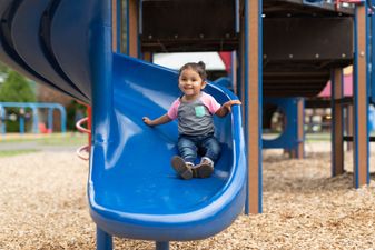 You should never let your child sit on your lap on a slide, expert warns