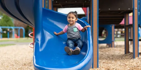 You should never let your child sit on your lap on a slide, expert warns