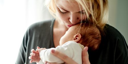 The newborn baby smell really does make you happy, according to science