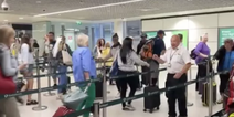 Dublin Airport worker goes viral for singing and dancing in security queue