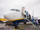 Passengers horrified after man opens plane door mid-flight