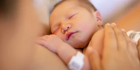 What is the newborn scrunch and why it happens