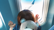 These tips may stop your child from crying if you wake them on a plane