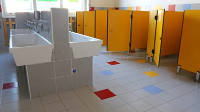 Parents express their concerns after school puts lockable gates on toilets