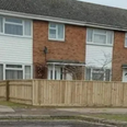Woman angers neighbours after building 100ft fence around garden